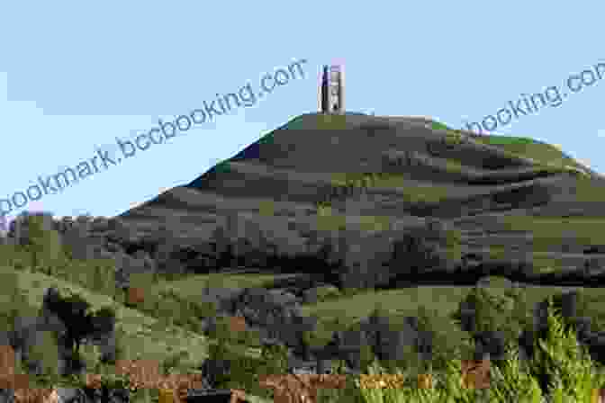 Glastonbury Tor, A Mystical Hill Steeped In Ancient Legends, Rises Majestically Above The Surrounding Landscape. The Glaston Giant (a Tale Of Merlin 2)