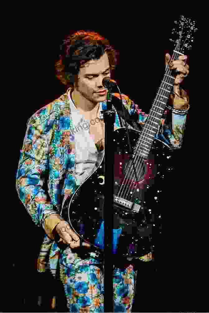 Harry Styles Striking A Pose With His Guitar Harry Styles: 150 Facts You Need To Know
